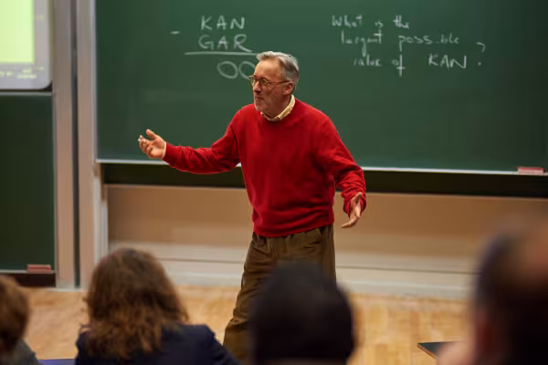 Charlie Gilderdale from NRICH leading interactive talk session at the Centre for Mathematical Sciences